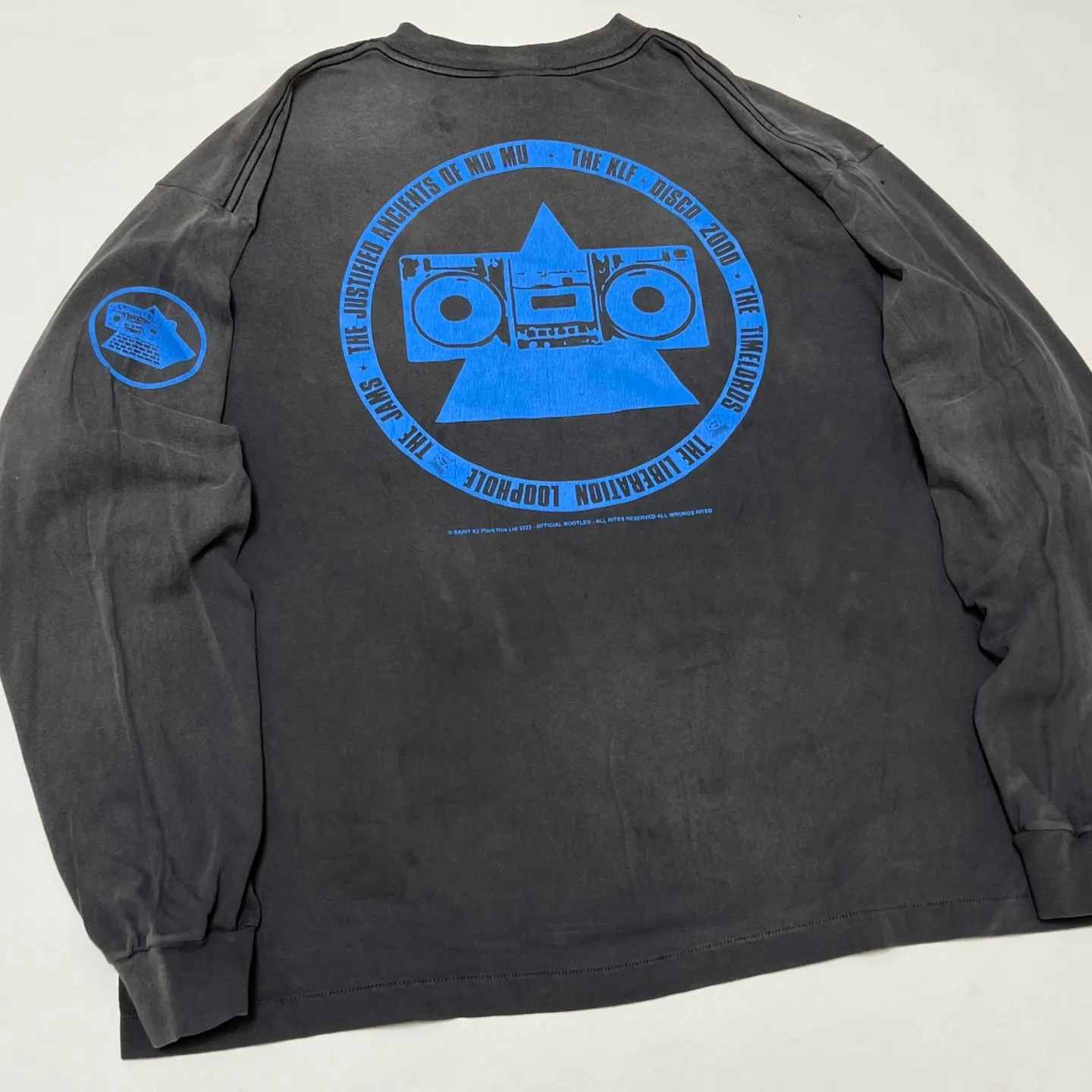 SAINT Mxxxxxx × The KLF BLUE KLF_LS TEE KLF/BLK Blue KLF tape recorder long sleeves Washed black S-XL Completely aligned Tube weaving fabric without side seams Garment dyeing Macau water fading and distressing Simulated sun washing and fading treatment Natural and perfect fading Hand-made holes and fraying Ink splashing treatment Correct main mark/wash mark/cherub anti-counterfeiting mark